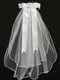 Communion Headpiece,  Organza Flowers Rhinestones and Pearls , T-460

24" Veil - Organza flowers, pearls & rhinestones
Satin Bows at the back
Made in the USA