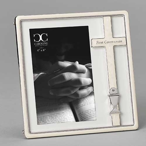 From the Caroline Collection,  this 7.25"H white enameled Holy Communion Frame holds a 4X6 photo. Frame is White Enamel with Silver embellishment around entire inner frame.   Cross and Chalice are shown on the right side of the frame. 