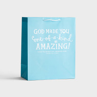 This large gift bag wraps your gift with love and inspiration and can be used to wrap gifts for recipients of any age- baby, toddler, older children, and yes, even adults!  A fabulous way of giving an additional blessing!
Message:
God made you one-of-a-kind amazing!
Scripture:
I praise You because I am...wonderfully made.  Psalm 139:14 NIV
Product Specifications:
Size:  12 15/16" x 10 7/16" x 5 3/4"
Value large bag
New International Version Scripture text
Sturdy rope handle
Coated paper

 