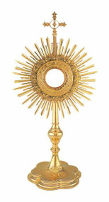 Contemporary Monstrance with Case-10-439.
23"H with layered floral wreath surround teh glass enclosure. Ornamental base. Gold rimmed glass luna for 12 3/4" host. full luna available at an additional cost. 