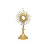 Golden monstrance with silver plated floral layers of open filigree
 