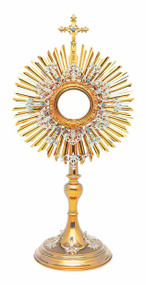 24k Gold & Silver-Plated 24"H  Marian Monstrance. Silver-Plated open floral filigree with blue stone elements around the rays, and applied to the base. Optional Gold-rimmed glass Luna for 2-3/4" host.  Includes Case.   A full Luna can be added to monstrance at an addition price. *As some items are made to order, Please allow 4-6 weeks for delivery. 