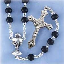 Attractive handmade black or white glass rosary with chalice centerpiece.