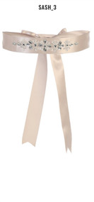 Pearl white sash with rhinestone flowers.
