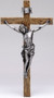 Resin/Stone Mix Crucifix with Antique Silver Corpus. Available in the following sizes:  SMALL: 8.5" [8.125"H x 4.25"W x 1"D]  MEDIUM: 13.25" [13.25"H x 7.25"W x 1.375"D]  LARGE: 20" [20.25"H x 10.88"W x 2.125"D]