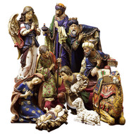 10 Piece Ornate Nativity  ~ Delicately painted 4" to 19.5" ornate figures made of a  resin/stone mix.  Ten piece set includes Baby Jesus, Blessed Mother, St Joseph, the Adoring Angel , the 3 Wisemen, Sheherd Boy, Sheep and Camel.