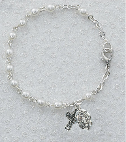 Youth Size 3 Millimeter Glass Pearl Bracelet.  Bracelet measures 6 1/2" in Length.  Bracelet has a Pewter Celtic Cross and Miaculous Medal Charm.

 