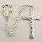 7 Millimeter White Pearl Rosary. Rhodium Crucifix and Miraculous Cut-Out Medal Center. Deluxe Gift Box Included.

