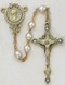 7 Millimeter Pearls of Mary Rosary. Gold Plated Pewter Crucifix has 4 pearls on cross and center has the head of Mary encircled in same white pearl beads. Deluxe Gift Box Included

