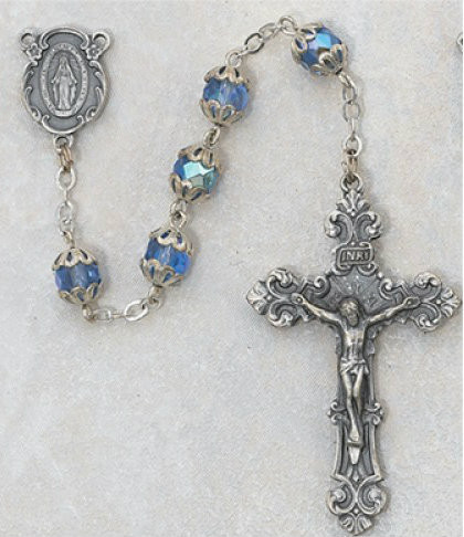 7 Millimeter Blue Capped Rosary
Silver Oxidised Miraculous Medal Center and Crucifix 
Deluxe Gift Box Included 
Prices are subject to change without notice