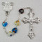 8 x 8 Millimeter Multi-Color Murano Heart Rosary. Rhodium Crucifix and Miraculous Medal Center. Deluxe Gift Box Included. 