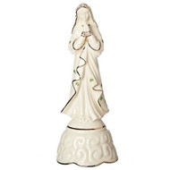 Musical 9" Porcelain Irish Madonna figure with Shamrocks. This Musical Irish Madonna plays an Irish lullaby. The Irish Madonna comes gift boxed. Beautiful gift for various occasions!
