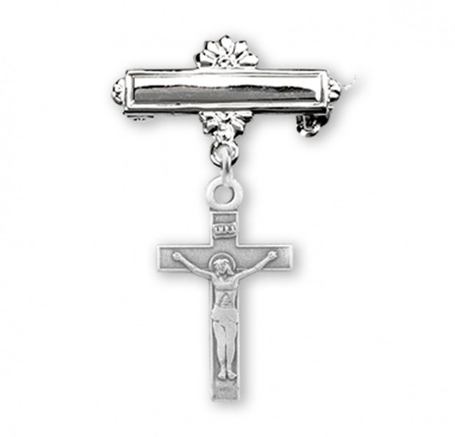 Sterling silver 1 3/16" Crucifix Baby Bar Pin. Dimensions: 1.2" x 0.7" (30mm x 17mm). Weight of medal: 0.5 Grams. Deluxe velour gift box. Sized for a baby, ideal for baptisms and christenings. Engraving on bar available. Made in USA.