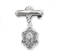 Baby Bar Pin ~ 1 3/16" Oval Miraculous Medal Bar Pin. Available in sterling silver,16 karat gold plated over .925 sterling silver, sterling silver with blue or pink enameled medal. Medals come in a deluxe velour gift box. Made in USA. Engraving on bar available up to seven letters only!