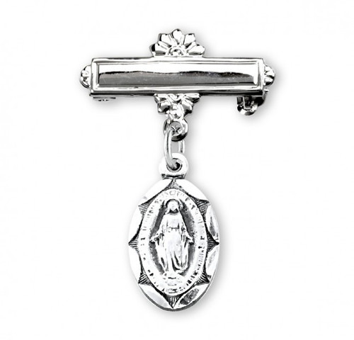 .925 Sterling Silver Double Sided Miraculous Medal oval pendant-bar pin. Dimensions: 1.0" x 0.7" (25mm x 17mm). Weight of medal: 1.0 Grams.Presents in a deluxe velour gift box. Engraving on bar available. Made in the USA

 