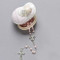 Girl Porcelain Bassinet Box with Rosary nestled inside. Perfect for New Baby or a Baptism Gift! The Porcelain Bassinet Rosaries are made of Porcelain and Glass. The Porcelain Bassinet measures 2.75"L x 2.25W x 1.25"H 13".  Pink Rosary is 6.50"  in length. Boxed