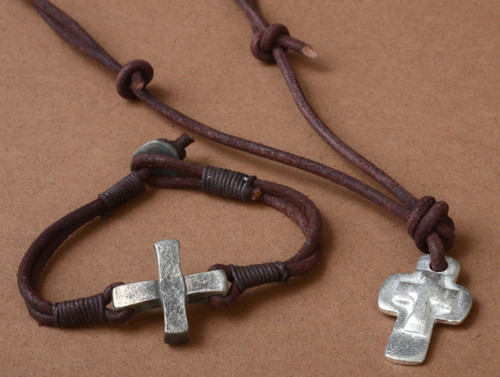 Triple Cross Pendant. Metal Cross on Leather Cord. Bracelet sold separately Item 58817

 