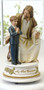 Musical Jesus and Boy Child Figurines that play "The Lord's Prayer". Dimensions: 7.25"H x  3.75"W x 3.75"D. Gift Boxed