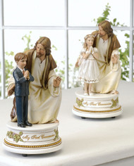 Musical Jesus and Boy/Girl Child Figurines that play "The Lord's Prayer". Dimensions: 7.25"H x  3.75"W x 3.75"D. Gift Boxed