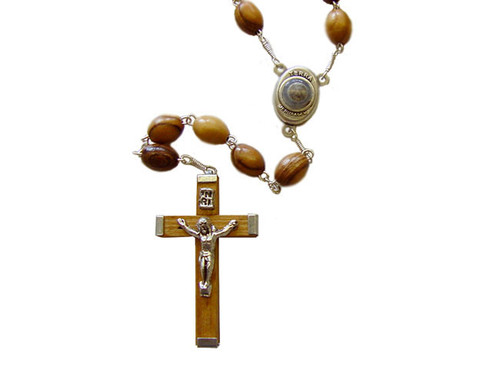 Olive Wood Oval Rosary (8mm).Mounted on a silver plated chain with centerpiece containing Earth from Bethlehem where Jesus was born. 
Rosary is about 21" inches long. Each decade is separated by a medal. This rosary is hand made in Bethlehem, the Holy Land.  
