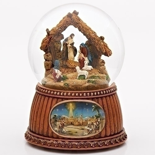 An image of the O Holy Night Nativity Snow Globe with a traditional Nativity scene within a globe filled with glitter and an illustration of Bethlehem at the base.