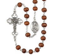 Premium handcrafted Italian imported 'Kant Tangle' rosaries. Rosaries are made with high-quality beads with a deluxe crucifix and center at affordable prices. Our 7 mm Round Brown Wood Bead 'Kant Tangle' Rosary comes with a deluxe crucifix and 'Sacred Heart' center. Unique and sturdy, this rosary makes a great gift for any occasion.