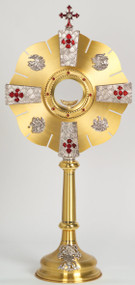 Two tone bright and satin finish. Gold plated w/oxidized silver detailing. Stones on face are red with enamel crosses. 28" height. 13" Face diameter. 7" base. Clip-style (glassless) luna. Secure acrylic glass enclosed luna to hold 2-3/4" host is available at an additional cost