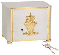 Satin silver plated with bright 24k gold detailing and basket design on front. Bright 24k gold finish on the interior, with vault lock. 6-1/2"H. x 8"W. x 7"D.