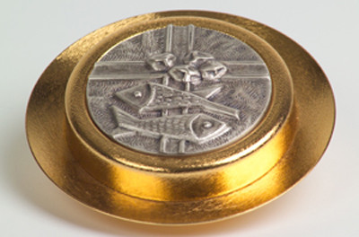 24k gold plated with a satin finish.  Cover has an oxidized silver emblem. Bright finish inside. Pyx is 4"D and has a 35 host capacity (based on 1 1/8" host). Use with burse K3148, sold separately.