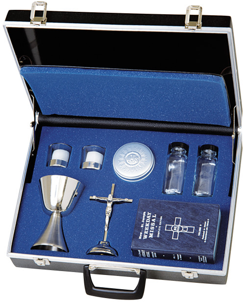 18" x 12" x 5" molded case with keys. Compartment for vestments, 6"H. stainless steel chalice (10 oz. cap.), 6"H. crucifix, two 10-hour glasses with candles and stainless steel holder, aluminum host box (3" dia., 100 host cap.), two 4 oz. glass bottles. Missal not included. Comes with or without stainless steel paten. Please select when ordering. 