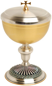 Gold plated and oxidized silver.
4" Base
7 5/8" height, 4 5/8" diameter cup.
300 host capacity (Based on 1 1/8" Host)
Complements Chalice 928

 