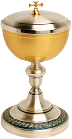 Gold plated and oxidized silver.
5" Base
8 3/4" height, 4 5/8" diameter cup.
300 host capacity (Based on 1 1/8" Host)
Complements Chalice 924