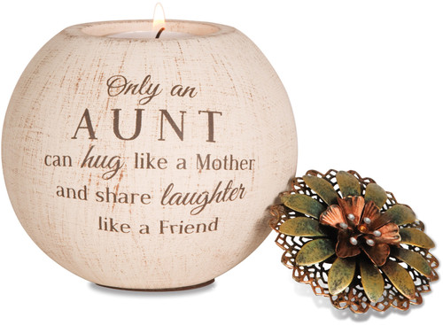 5" Round Tea Light Candle Holder. Tea light Candle Holder is  packaged securely in a printed box. The candle holder is made from terracotta and features a decorative metal lid and fits a regular tealight (included)."Only an Aunt can hug like a Mother and share laughter like a Friend" is written on the front of the candle holder.

 