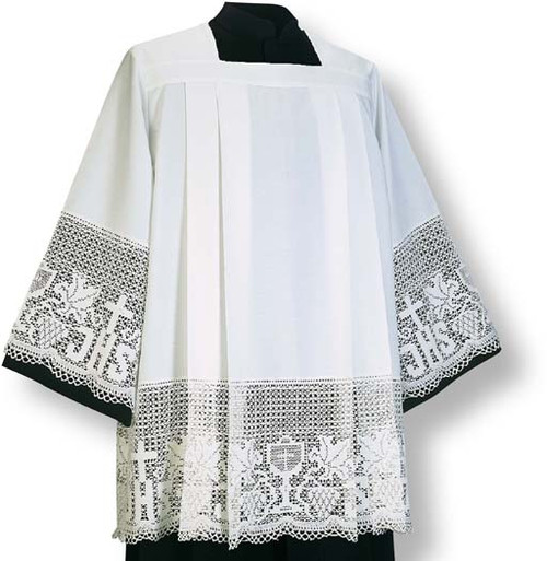Washable surplice-alb, matching surplice-alb 444-3382; pulled over the head.
In RAVENNA, with lace.
Square neck with four pleats front and back. 
Easy to launder, wash-and-wear fabric
Normally ships within 32 working day(s), with the exception of hand-embroidered and custom orders.
All sizes measured from top of shoulder to hem. 
These items are imported from Europe. Please supply your Institution’s Federal ID # as to avoid an import tax.  Please allow 3-4 weeks for delivery if item is not in stock.