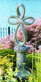 Cast Stone Eternity Cross shown with Contemporary Pedestal (#8250, sold separately, Eternity Cross sits inside the pedestal.) H: 38.5", BW: 22", BD: 11.25". Weight: 68 lbs. Made to order.... Allow 4-6 weeks for delivery. Made in the USA! 

 