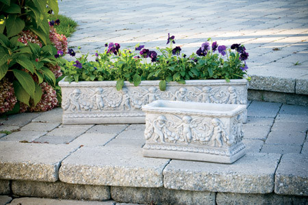 This large angel box planter features beautiful detailing and angel molding. This planter is longer than our other angel box planter, allowing you to plant more flowers.

Details:

8"H x 7"W x 34"L
59 lbs
Made to order. Allow 4-6 weeks for delivery
Made in the USA
