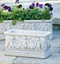 Cement Angel Flower Box Planter. This box planter features small angels and beautiful detailing that will help your garden stand out. Plant your favorite flowers in this gorgeous angel planter box.

Details:

7.75"H x 7"W x 15"L
20lbs
Made to order. Allow 4-6 weeks for delivery
Made in USA
