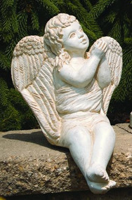 A cement angel sitting on a concrete ledge with arms clasped up towards the sky. Cement Sitting Angel Blowing Kiss. Dimensions: H: 14.5", W: 9.5", L: 10.5", Wt: 14 lbs. Handcrafted and made to order. Please allow 4-6 weeks for delivery. Made in the USA!

 

 