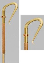 Size 72" high. Wood hand hold sections with Brass construction, 24k Gold Plated, design of 6 imitation cabochon rubies. Crozier disassembles into 4 sections for easy transport.  Rubber bumper terminates staff bottom.


