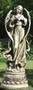 Garden statue of an angel on a pedestal, holding a dove.