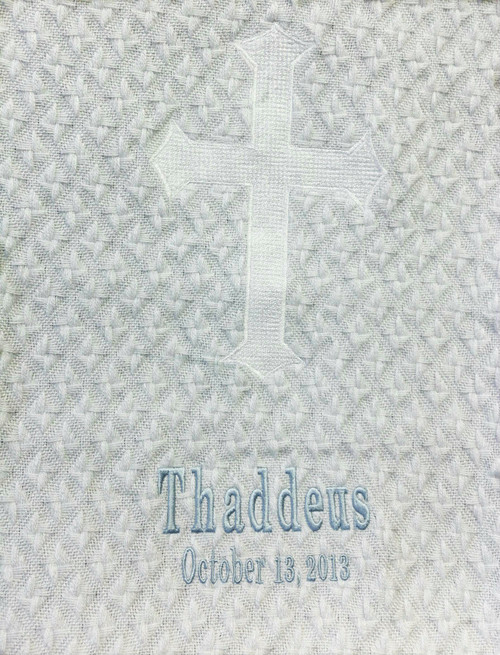 Unisex Christening Shawl. With its simple cross design, this christening shawl is made especially for that special day. Made of soft 100% acrylic for baby's comfort. Size: 40" x 40". Finished with a fringe border. Can be embroidered with name and date of Baptism.   15 Letters per line ONLY! Please allow 7-10 days for embroidery. Rush embroidery is available at an additional cost. 