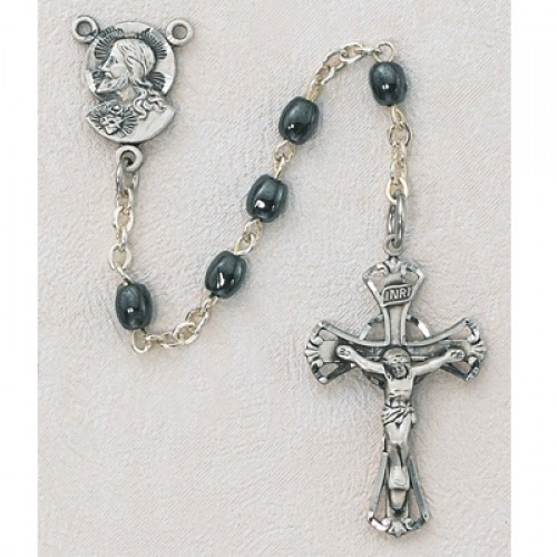 Sterling Silver Oval  Hematite beads. Center is the head of Christ
