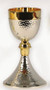 Gold and silver plated. 8” H., 3 3/8” diameter cup, 4 1/2” base, 8 oz. capacity