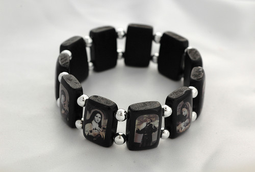 Popular Brazilian Wood Stretch Bracelet. Portrays black and white images of popular Saints and visions of Our Lady. 3/4" Black Wooden Rectangular Shape separated by Beads. 

 