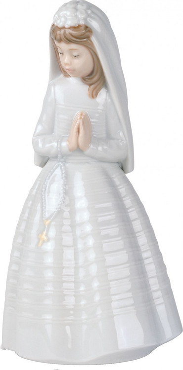 This 9.5"H Nao Girl Praying figurine is a popular favorite for First Holy Communion gifts. The girl is dressed in a beautiful white dress with white vail. Her hands are in the classic praying position and she has Rosary Beads. A great gift for your granddaughter's special religious event. Handcrafted of fine porcelain.Hand-crafted down to the finest detail, this fine collectible quickly becomes a treasured keepsake. Gift Boxed. Year Issued 1992