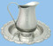 Bright pewter finish ewer is 8-1/2" Height and has a 4" Base diameter. 38oz Capacity. Cover and tray NOT INLCUDED 