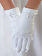 Matte Satin White Gloves with Pearl Cross. Gloves come in sizes 4-7 or 8-14. Please make selection when checking out.  