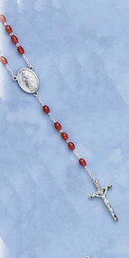 Divine Mercy Deluxe Chaplet with Oval Red Beads. Packaged with a Divine Mercy "Jesus I trust in you" holy card with instructions on how to say the chaplet on reverse side.  (Overall 4” x 2.5”)