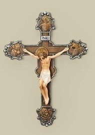 10" Resin/stone mix Evangelist Crucifix. Dimensions: 10.25"H x7.5"W x 1"D. The icons adorning this crucifix represent the winged "living creatures" associated with the Four Evangelists: St. Matthew, the Man, St Mark, the Lion, St. Luke the Ox and St. John the Eagle. These portrayals have often appeared in religious art and architecture. 
