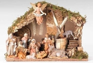 Fontanini 11 Piece Nativity Set including an Italian Stable.  Dimensions of Stable: 11.5H X 16.75"L X 8.5"D. Materials: Wood, Moss, Bark, & Polymer